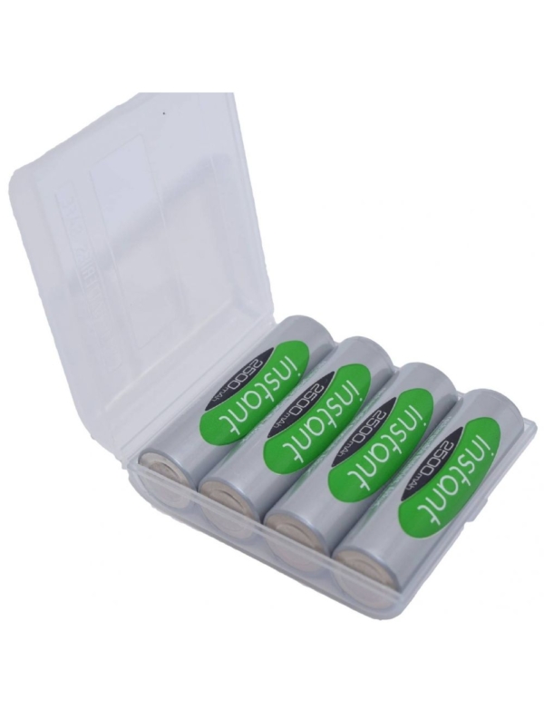A clear plastic case holds four AA rechargeable batteries labeled "INSTANT 2500mAh." The batteries have a silver body with a green label featuring white and black text. The case is open, displaying the batteries neatly arranged inside.